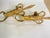This pair of sconces, in gilt Iron metal. They are Italian manufacture. Gold color. Up to 250V (Europe/UK Standard).The...