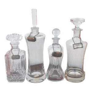Vintage Mid-Century Modern Glass Decanters Including a Kluk Kluk Decanter by Jacob Bang - Set of 4