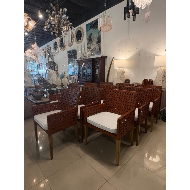 Set of 10 vintage double cane woven rattan arm chairs. Additional chairs available if needed, please Inquire. These have...