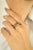 Add a burst of color and brilliance to your jewelry collection with this dazzling 14K white gold band ring. Featuring a...