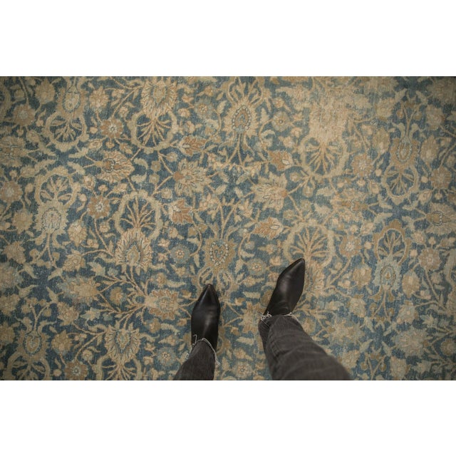 :: Covered field in a repeating floral palmette, cloud band, and blossom design rendering with thin scrolling vines...