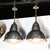 This pair of Art Deco Machine Age industrial pendants, American-made around 1935, embodies the era’s dynamic fusion of...