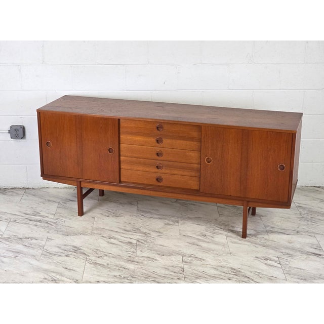 Stunning Swedish Made Teak Credenza By Yngve Ekström For DUX Of Sweden. 2 Spacious Cabinets Flank 5 Drawers Nestled In The...