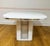 Beautiful classic white laminate but with the chrome details. This table pedestal has glassblocks inserted which makes it...
