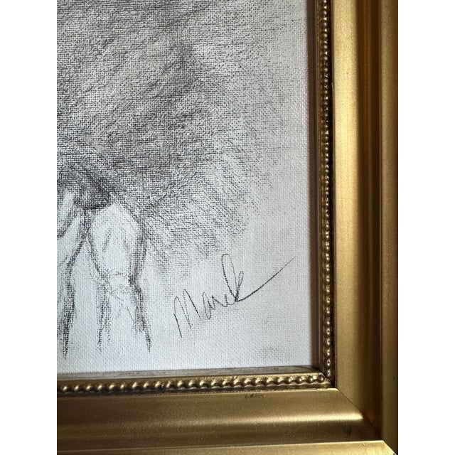 An intimate charcoal nude study on canvas, signed “Marek,” and presented in a classic gilt frame with rope-edge and beaded...