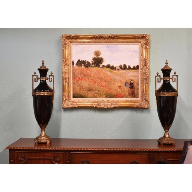 Tall Neoclassic Style Heavy Ceramic Black Colored Vases/Urns Mounted to Round Brass Bottoms Accented by Extended Brass Handles - A Pair For Sale - Image 10 of 12