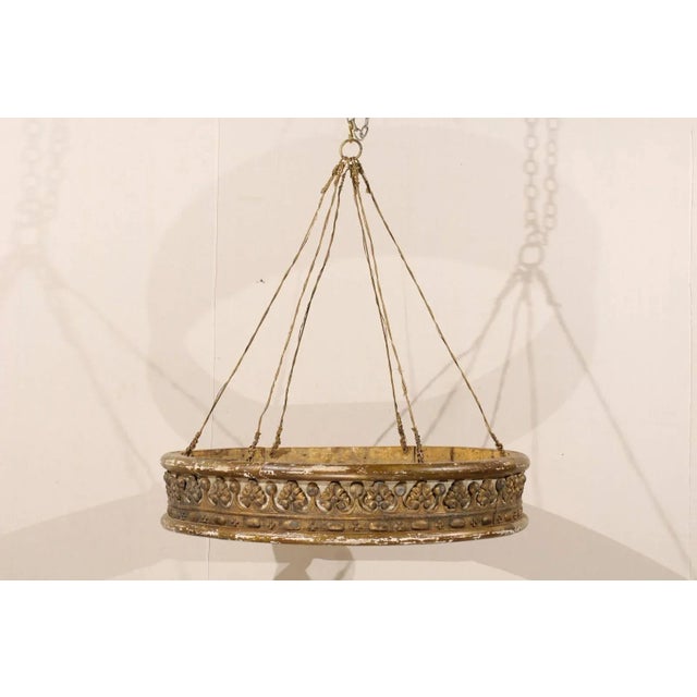 An Italian mid-19th century painted and giltwood bed corona (bed crown). This Italian bed corona has a nicely carved...