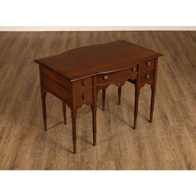 High Quality American Made Antique Oak Writing Desk Featuring A Serpentine Shaped Front, Turned And Tapered Legs With...