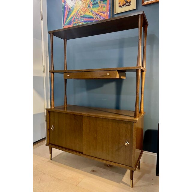 This piece is great as a room divider, display shelf, record and turntable storage , etc. All shelves can hold albums. The...