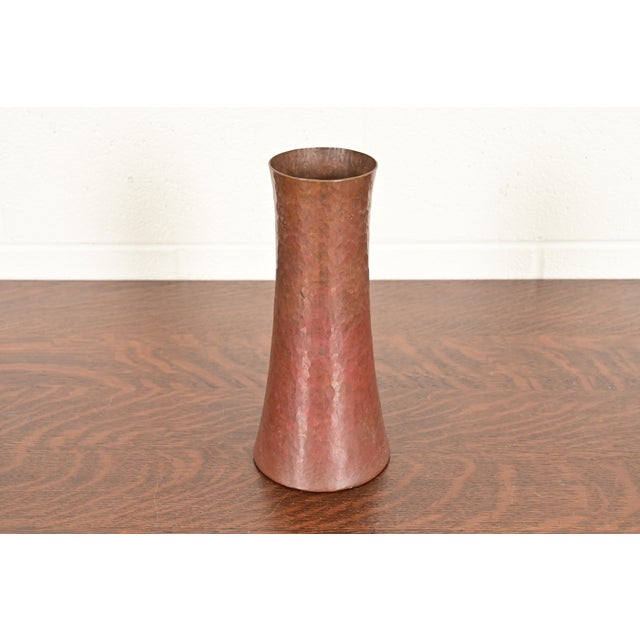 A gorgeous Arts & Crafts hand hammered copper vase In the manner of Roycroft By Ramon Ramirez Mexico, Mid-20th Century...
