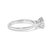 Immerse yourself in the refined elegance of this exquisite engagement ring, where contemporary design meets classic...