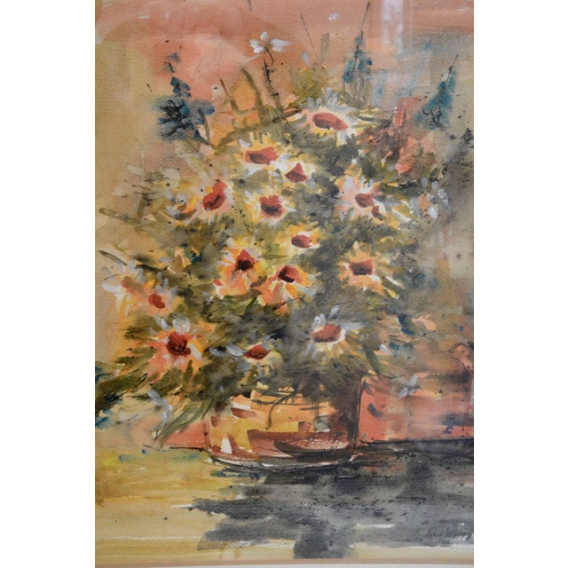 The beautiful flowers in this watercolor painting will be a lovely addition to your decor. The painting was created by...