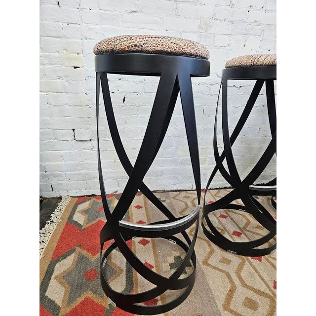 Set of (3) Cappellini Ribbon Stools, designed by Nendo, featuring a unique structure made from metal folded into...