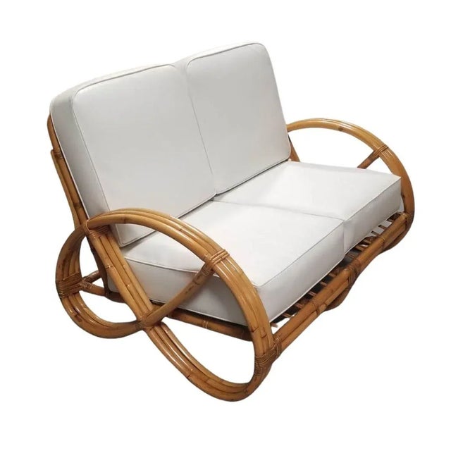 Restored mid-century era round full pretzel two-seat settee Loveseat with a three-strand round pretzel armrest. 1950,...