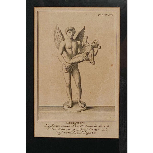 An 18th or 19th century Italian engraving of a putto.