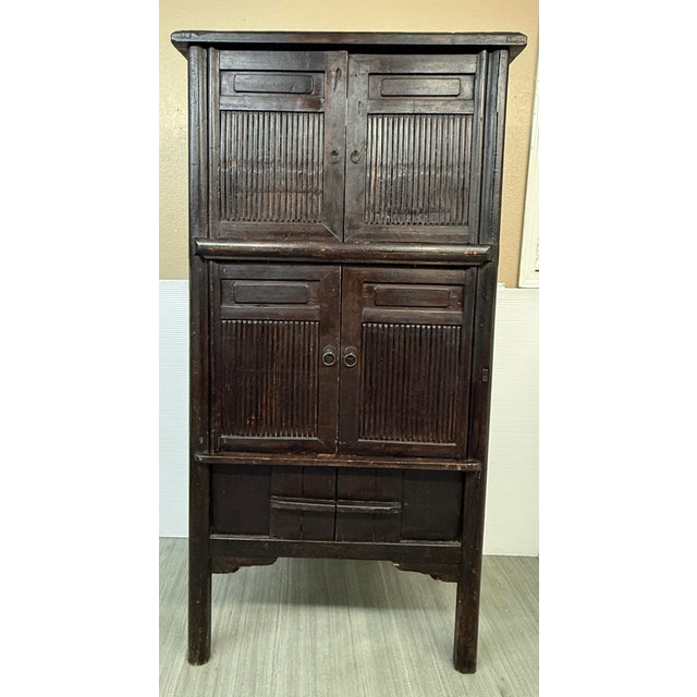 Design Plus Gallery presents an Antique Food Cabinet, known as a Liangchu, from China. The style dates to the Qing Dynasty...