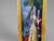 A striking 1980s French Louis XVI–style decorative wall art piece, crafted with a tall gilded beechwood frame and a...