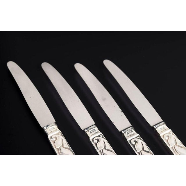 Evald Nielsen, set of four fruit knives. Elegant fruit knives in sterling silver and stainless steel with a classic softly...