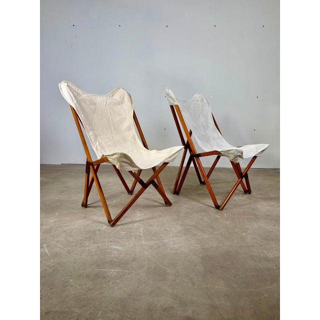 Pair of Tripolina Chairs – Citterio, Early 1970s An elegant pair of Tripolina chairs, an iconic design originally patented...