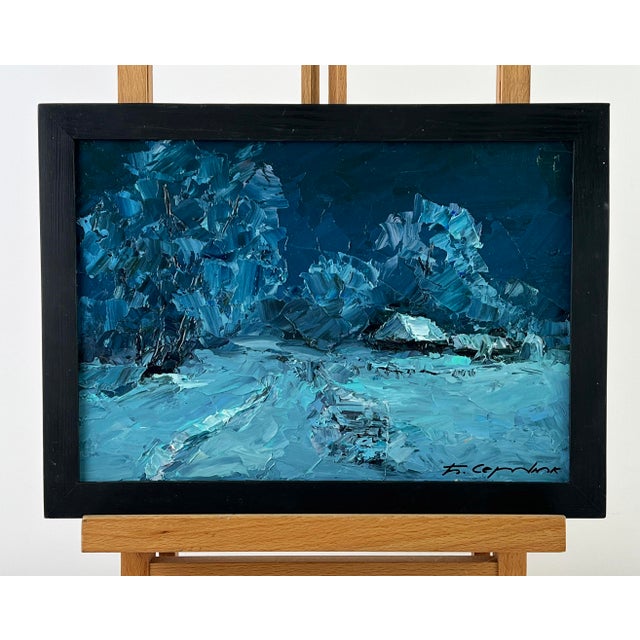 Oil painting Winter Night Serdyuk Boris Petrovich is an atmospheric winter landscape immersed in deep blue evening tones...