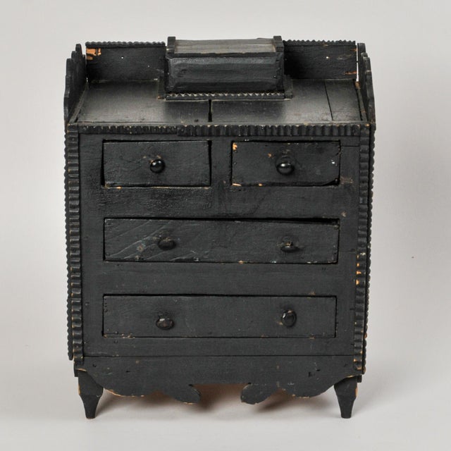 An adorable small four drawer folk art box with charming details. Primitive style and condition this piece is made from...
