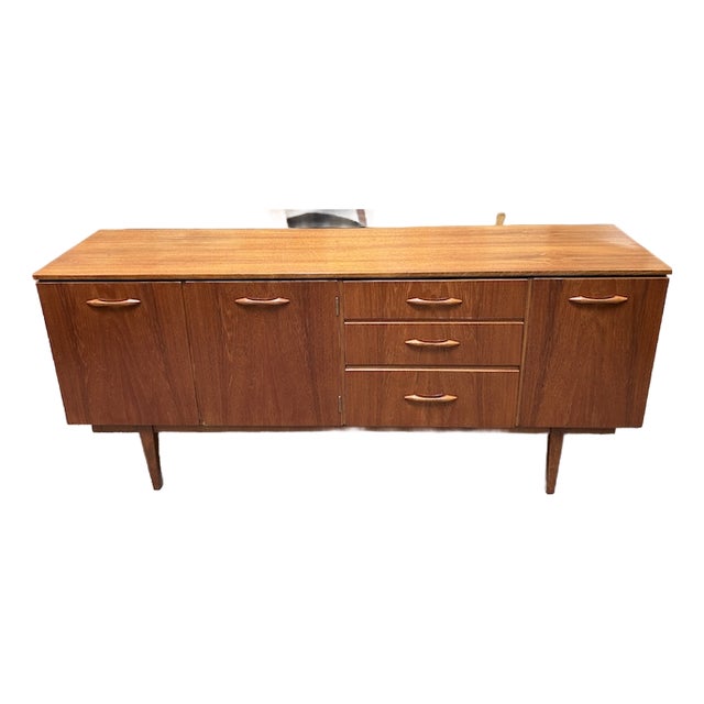 Mid Century Modern Teak Credenza c.1960 Left Side Cabinet W/ Shelf and Drawers. For Sale