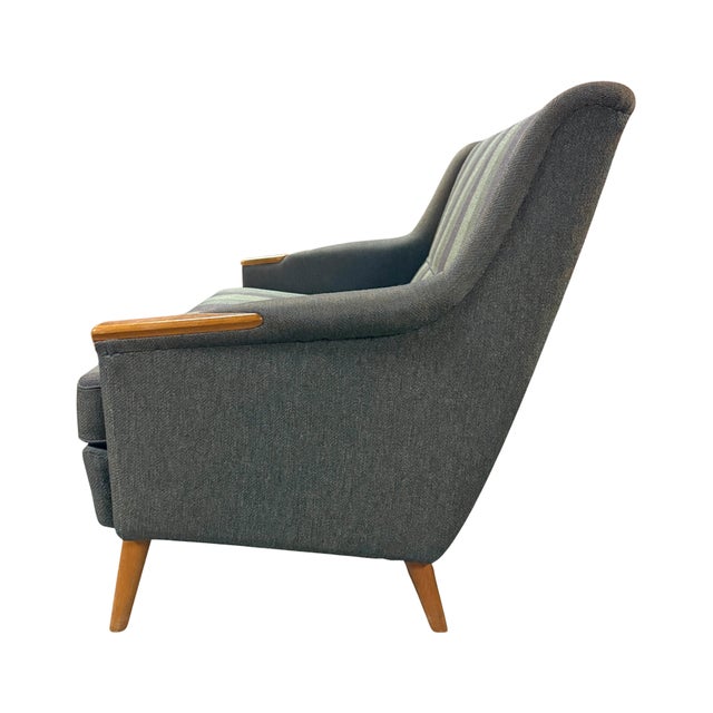 Vintage mid-century Danish modern two-seater beech and wool "Lani" sofa by Larsson & Nilsson, Sweden. Features original...