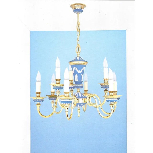 This magnificent and exquisite 9 lights Chandelier, in brass and porcelain with a refined mat blue color, the original...