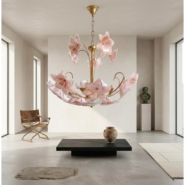 An ethereal bouquet of light, sculpted in Murano glass. This refined 1970s chandelier captures the romantic essence of...