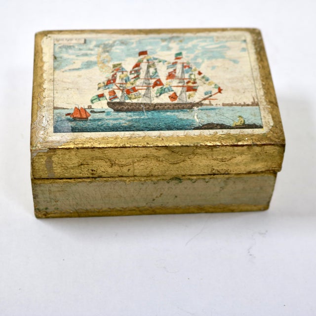 Fantastic Florentia wooden box. It is gilded on the sides and bottom with ornate scrolled details. The details of the...