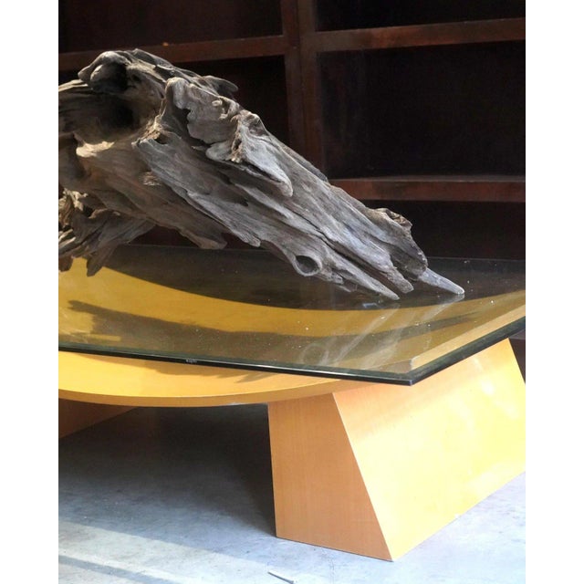 A striking vintage Italian coffee table with an architectural, almost floating silhouette. Measuring an impressive 68...