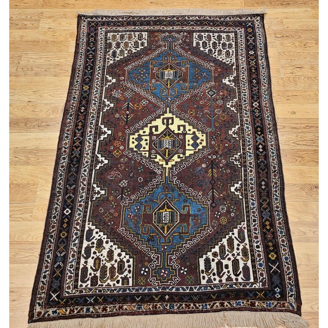 "A beautiful early 20th century Persian Qashqai tribal area rug of great visual boldness and cultural authenticity — hand-...