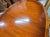 Brown English Regency Revival Flame Mahogany Oval Extension Dining Table With Satinwood Crossbanding and Brass Paw Feet, Circa 1935 For Sale - Image 8 of 9