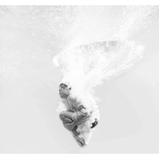 Tara Moore, Man Dive Bombing Into Water, Photographic Paper, in Flawless conditions. Designed from 2000 This piece has an...