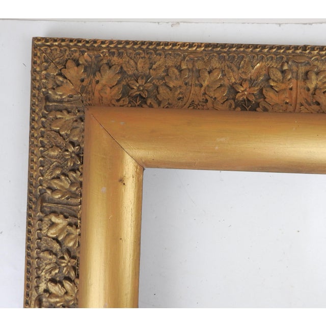 Antique late 19th century ornate giltwood picture frame. Holds a mirror or painting 16.25" x 14.25". Some minor surface...