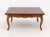 French Provincial Style Parquetry Top Oak Coffee Table, atop cabriole legs. 18" H x 39.25" W x 39.25" D. Provenance: From...