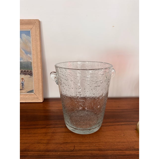 Hand-blown at La Verrerie de Biot on the Côte d’Azur, this classic French vintage 1960s champagne bucket shows the...