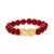 Fire-kissed red meets luminous gold in this captivating beaded bracelet, a talisman of strength and auspicious beginnings....