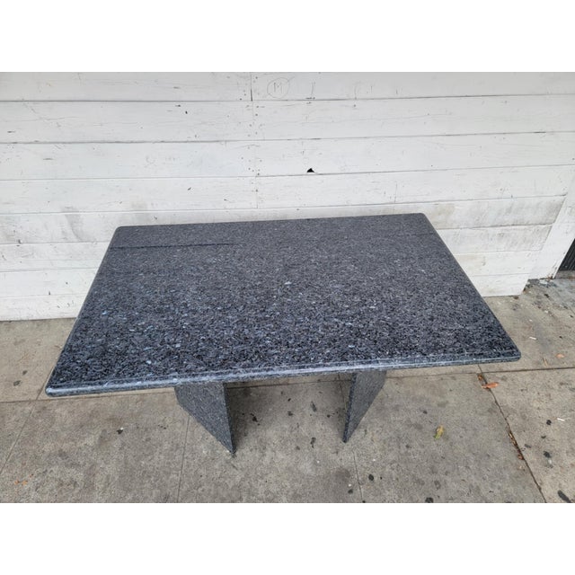 Vintage modern artic blue granite dining table with two V shape base. rectangle top. bases can use in different ways....