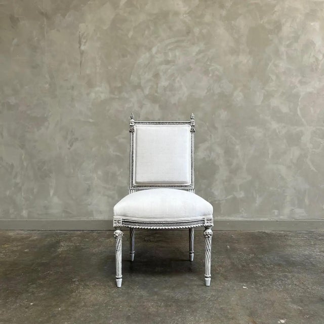 Antique Louis XVI style painted and upholstered chair Painted in an oyster french gray washed finished, with subtle...