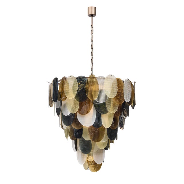 Murano glass chandelier from the island of Murano outside of Venice, Italy. This fixture features layers of organically...