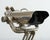 Industrial 20th WWII style naval anti-aircraft binoculars mounted to a large adjustable height tripod stand. Constructed...