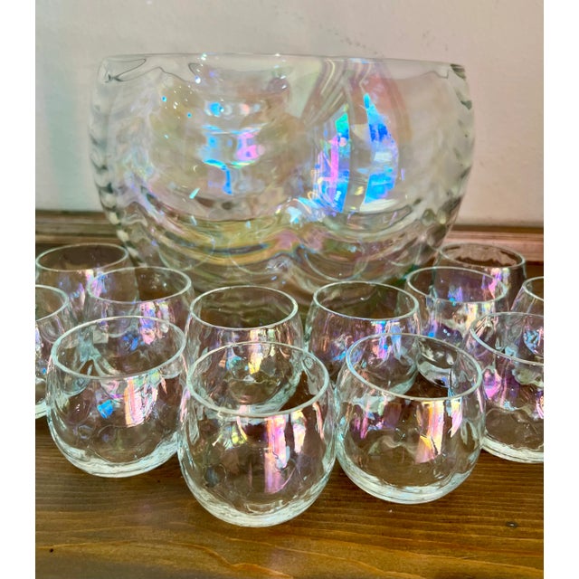 This breathtaking mid century, vintage draping iridescent 13 piece punch bowl set is in excellent condition. The rainbow...
