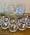 This breathtaking mid century, vintage draping iridescent 13 piece punch bowl set is in excellent condition. The rainbow...