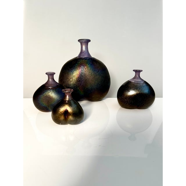 This set of art glass vases from the Volcano series was designed by glass artist Bertil Vallien in 1981 for the Kosta Boda...