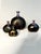 This set of art glass vases from the Volcano series was designed by glass artist Bertil Vallien in 1981 for the Kosta Boda...