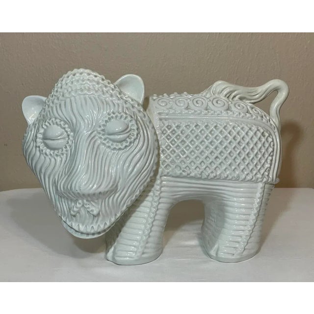 Unique Mid Century Italy Patterned & Textured Pottery Lion Figurine. White/off-white with a section of ribbed bands at the...
