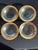 A set of four Annieglass Roman Antique bowls, each hand-formed with a wide, shallow profile and finished with a band of...