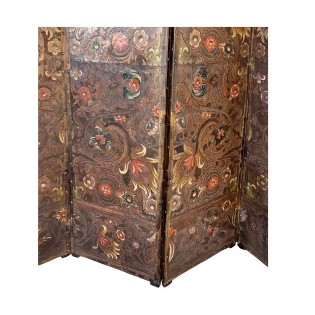 Spanish Painted and Parcel-Gilt Leather Four Panel Screen, crafted from tooled and painted leather mounted on a wood...