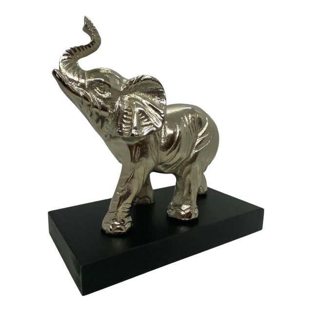 Contemporary Silver Aluminum Metal Elephant Sculpture Standing on Black Wood Plinth For Sale